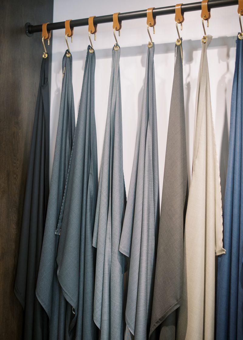 Suiting fabric on the drape rail